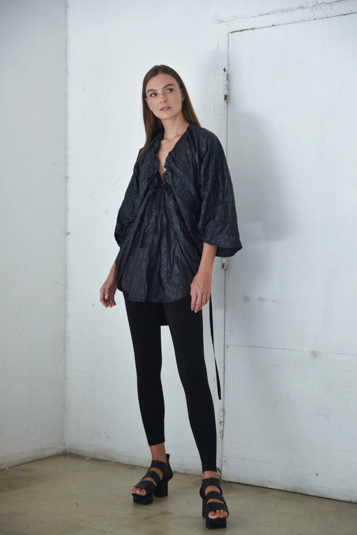 Light blue Mykonos tunic top by SIMPLY MILA, featuring flowing fabric and relaxed fit for modern women's casual style.
