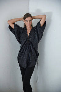 Light blue Mykonos Tunic top by SIMPLY MILA featuring short sleeves and a relaxed fit, perfect for casual summer wear.