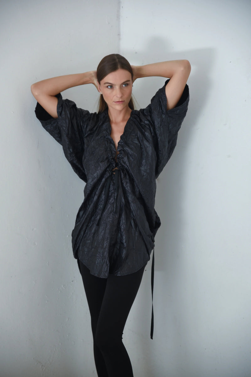 Light blue Mykonos Tunic top by SIMPLY MILA featuring short sleeves and a relaxed fit, perfect for casual summer wear.
