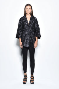 Front view of a beige Mykonos Tunic by SIMPLY MILA Modern Women's Clothing, featuring a relaxed fit and stylish design.