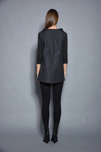 Reversible tops by SIMPLY MILA, stylish women's clothing featuring a versatile, modern design in various colors and textures.