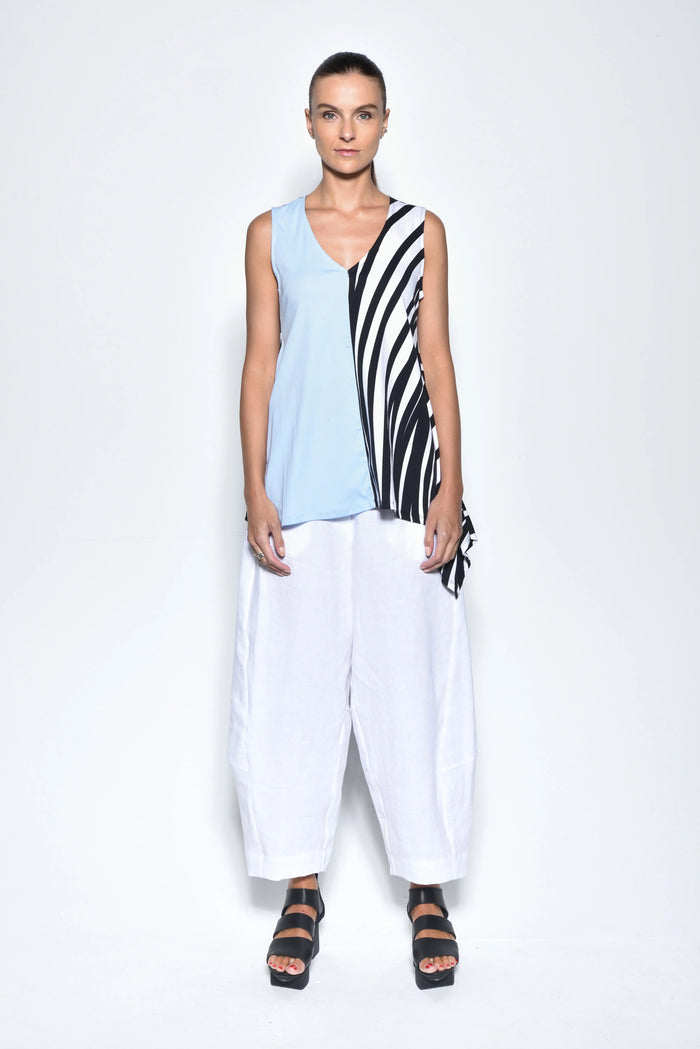 Front view of the Irene top by SIMPLY MILA, a stylish women's sleeveless blouse in soft fabric with a round neckline.