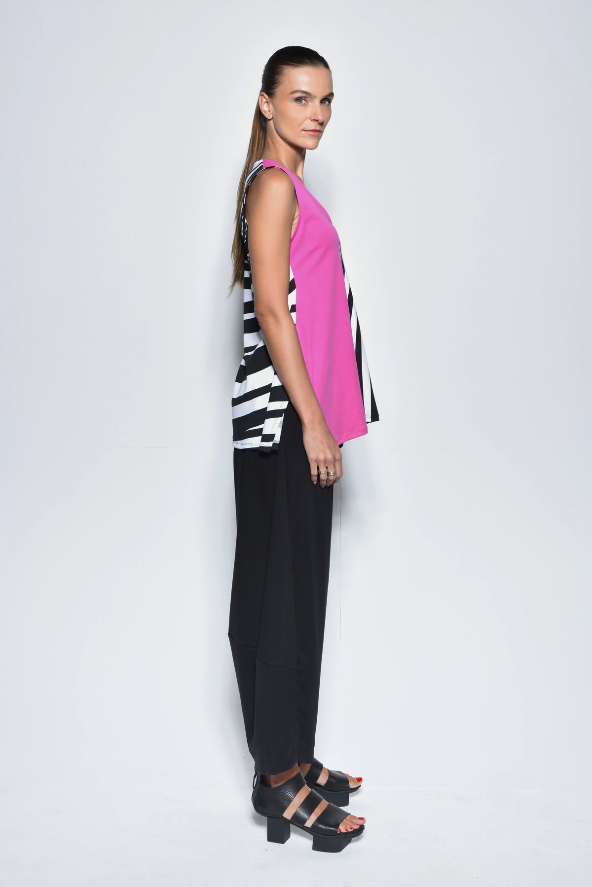 Fuchsia Irene top by SIMPLY MILA Modern Women's Clothing, featuring a stylish design and comfortable fit.