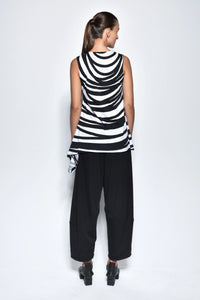 Back view of the SIMPLY MILA Irene women's top, stylish sleeveless blouse with a relaxed fit and modern design.