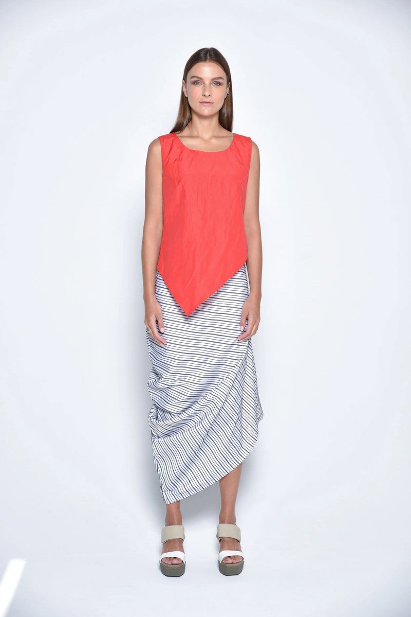 Red uneven hem tank top by SIMPLY MILA, modern women's clothing, featuring a stylish asymmetrical hem and sleeveless design.
