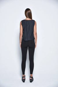 Black uneven hem tank top from SIMPLY MILA Modern Women's Clothing, featuring a relaxed fit and stylish asymmetrical hem.