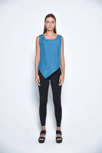 Black uneven hem tank top by SIMPLY MILA, featuring a stylish asymmetrical hem and sleeveless design for modern women's fashion.