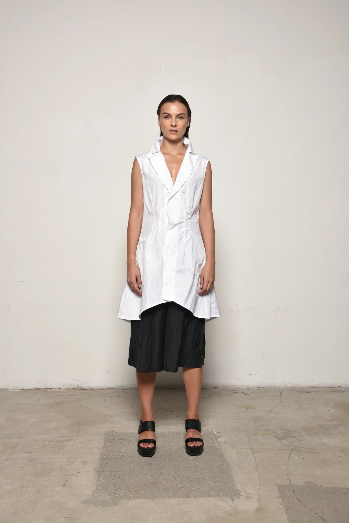 White Imperial Tunic from SIMPLY MILA Modern Women's Clothing, front view showing relaxed fit and stylish design.