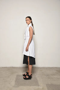 White Imperial Tunic by SIMPLY MILA, modern women's clothing, side view showcasing relaxed fit and stylish design.
