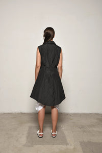 Back view of a black Imperial Tunic by SIMPLY MILA, a modern women's clothing top with a relaxed fit and stylish design.