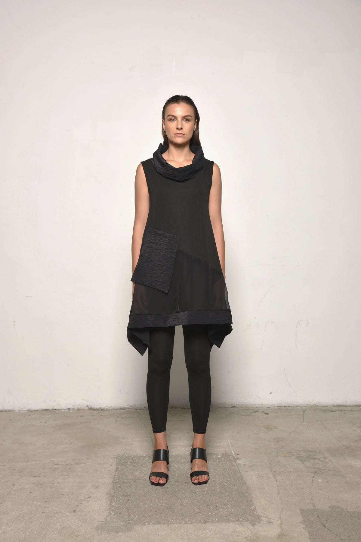 Front view of a sleeveless mix tunic by SIMPLY MILA, featuring a modern women's fashion design in soft, breathable fabric.