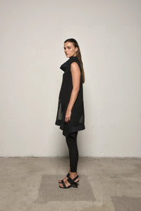 Side view of a sleeveless mix tunic from SIMPLY MILA, showcasing its stylish design and lightweight fabric for modern women's fashion.