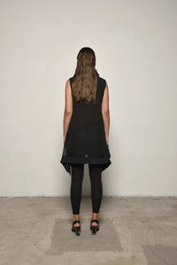 Back view of SIMPLY MILA sleeveless mix tunic, modern women's clothing, soft fabric and stylish design.