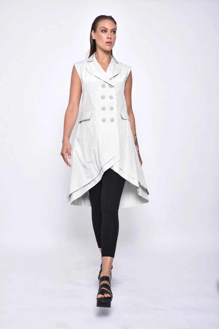 SIMPLY MILA modern women's tunic vest in neutral fabric, layered over a blouse, showcasing casual chic style.
