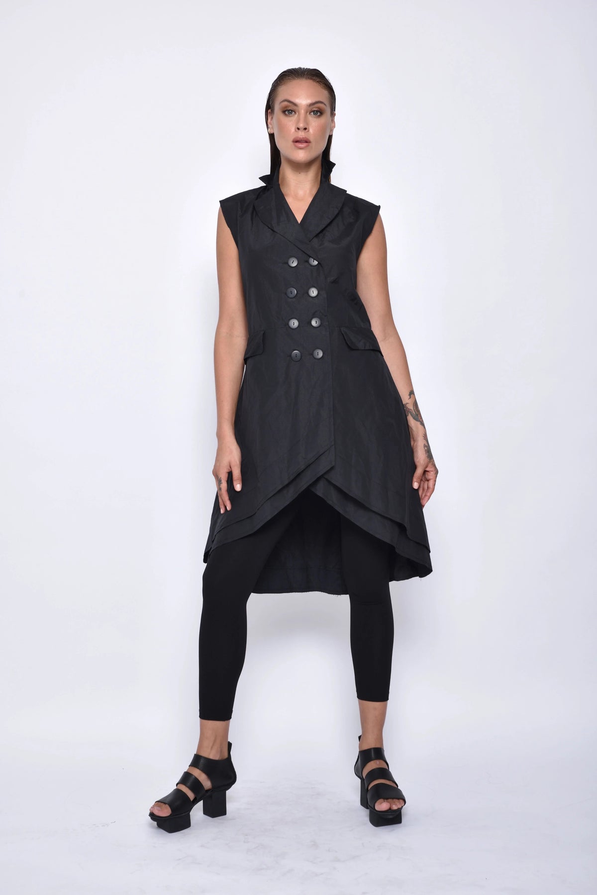 Black tunic vest from SIMPLY MILA Modern Women's Clothing, featuring a sleeveless design and stylish modern fit.