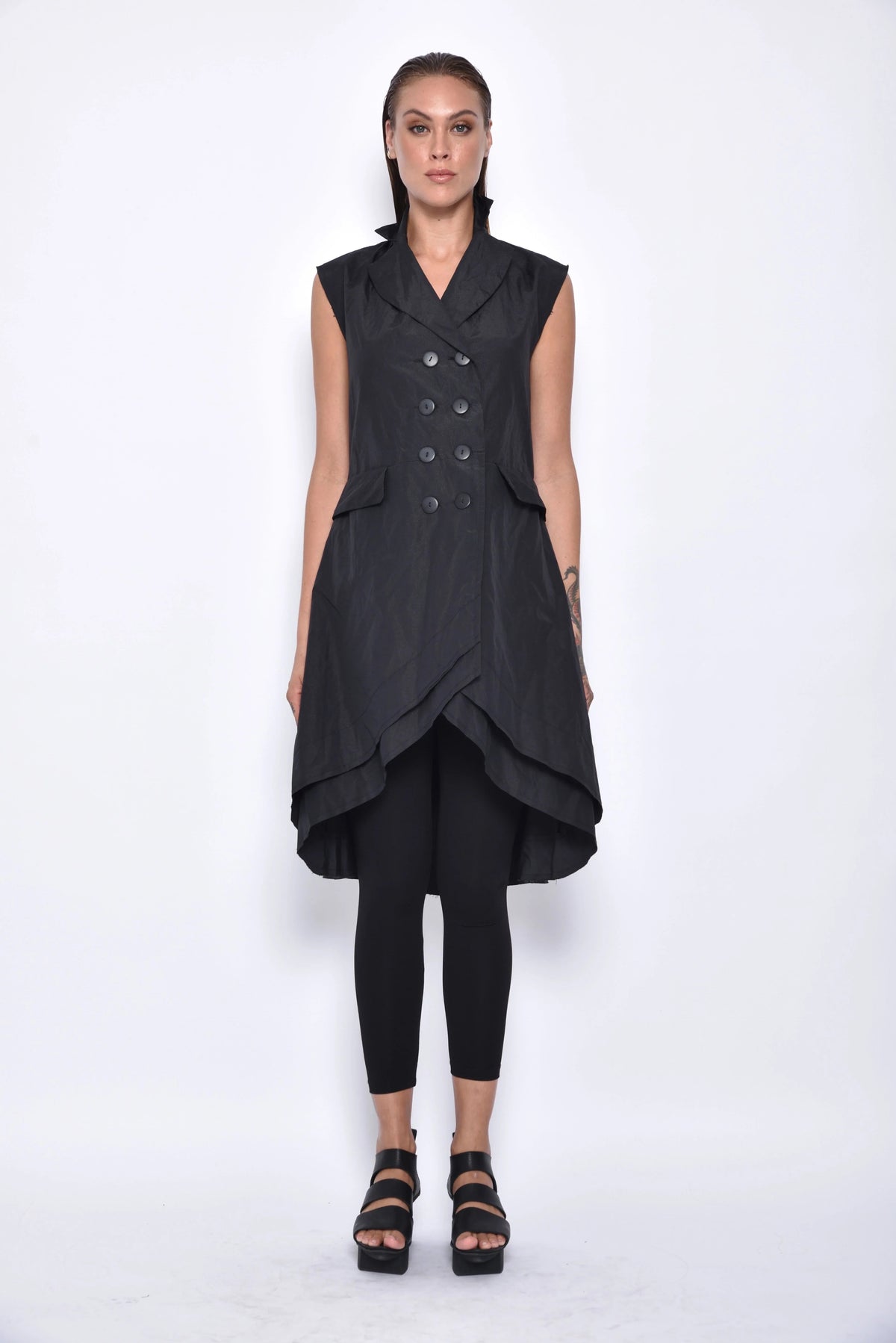 Front view of a stylish SIMPLY MILA modern women's tunic vest, featuring a sleek, sleeveless design and contemporary fit.