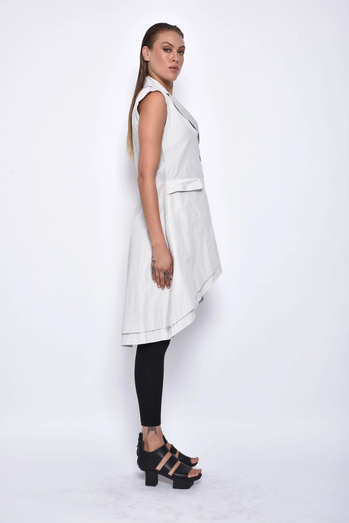 Side view of a stylish SIMPLY MILA modern women's tunic vest in a versatile, lightweight design.