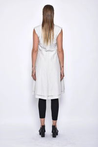 Back view of a stylish SIMPLY MILA modern women's tunic vest, showcasing its tailored fit and sleek design.