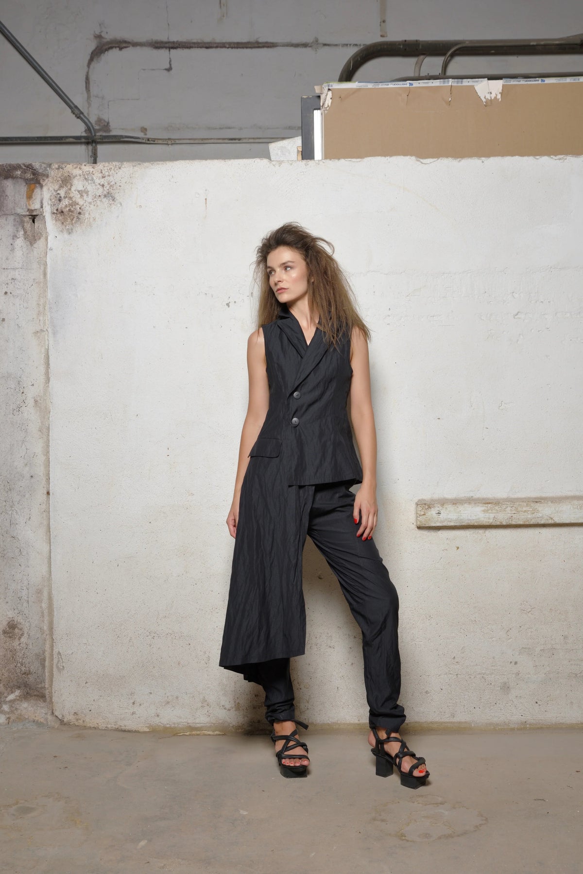 Fashionable uneven vest from Simply Mila Modern Women's Clothing, styled with layered textures and a trendy silhouette.