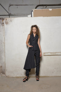 Uneven vest by SIMPLY MILA Modern Women's Clothing, featuring a stylish asymmetric design and lightweight fabric.