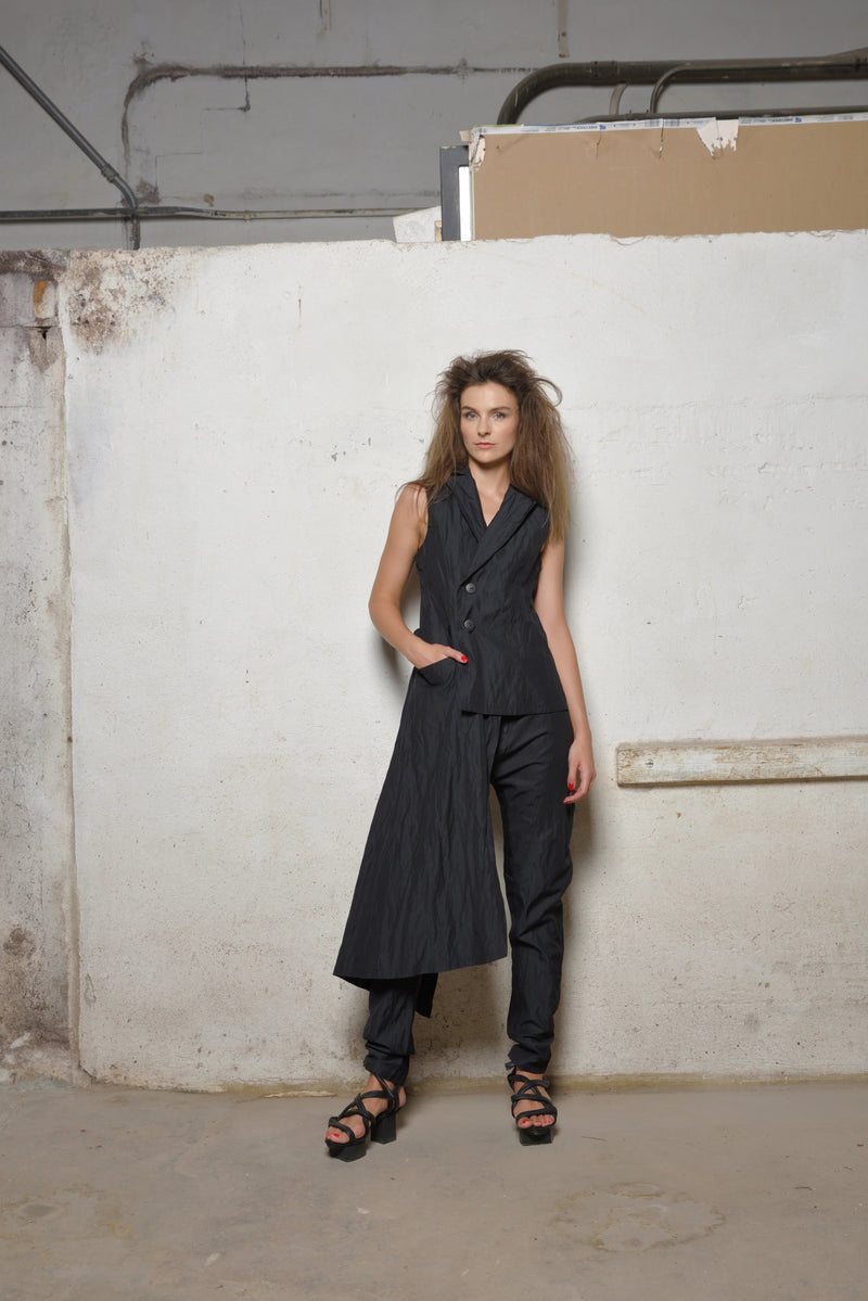 Uneven vest by SIMPLY MILA Modern Women's Clothing, featuring a stylish asymmetric design and lightweight fabric.