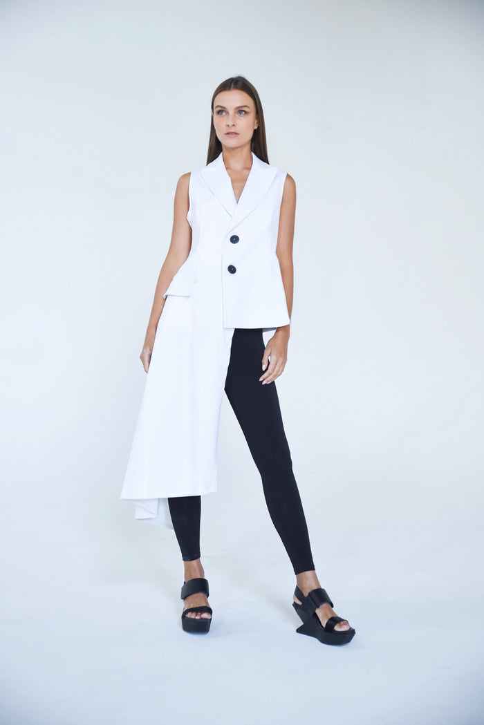Uneven beige vest by SIMPLY MILA Modern Women's Clothing, featuring a textured, asymmetrical design and stylish fit.