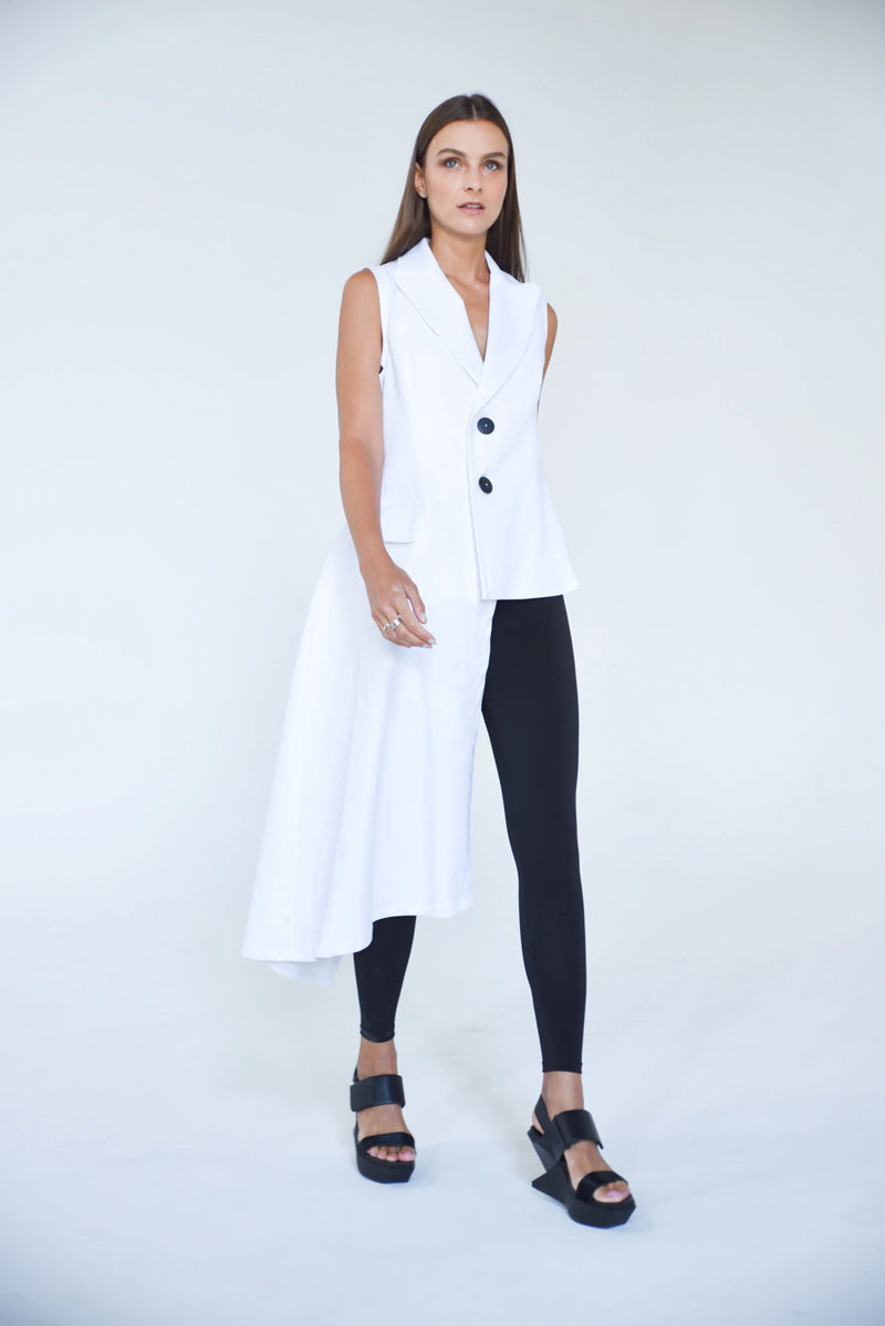 Uneven vest from SIMPLY MILA Modern Women's Clothing featuring a stylish, asymmetrical design and textured fabric.
