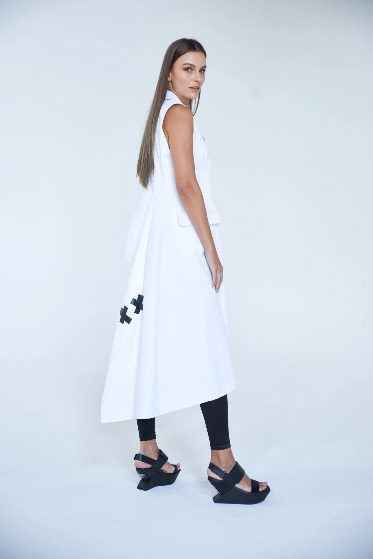 Simply Mila modern women's uneven vest with asymmetric hem and stylish design, shown in a close-up shot.