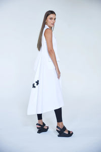 Simply Mila modern women's uneven vest with asymmetric hem and stylish design, shown in a close-up shot.