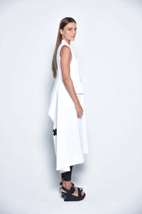 Side view of a stylish uneven vest by SIMPLY MILA, featuring modern women's clothing design and textured fabric.