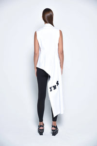 Back view of a SIMPLY MILA Modern Women's Clothing uneven vest in textured fabric, showcasing its asymmetrical design.