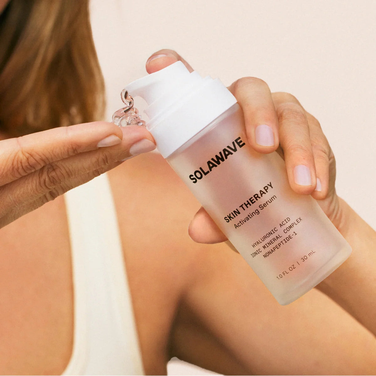 Solawave Skin Therapy Activating Serum in a 30ml bottle, skincare topical for revitalizing and nourishing the skin.
