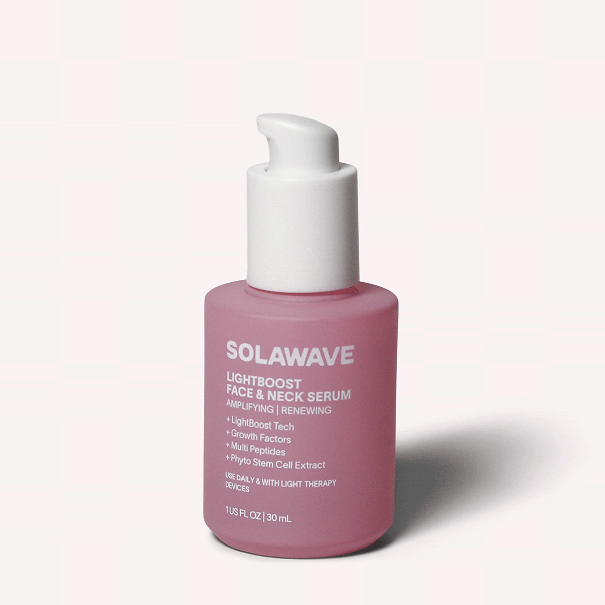 Solawave Light Therapy Boosting Face and Neck Serum in a sleek skincare bottle with a pump dispenser.