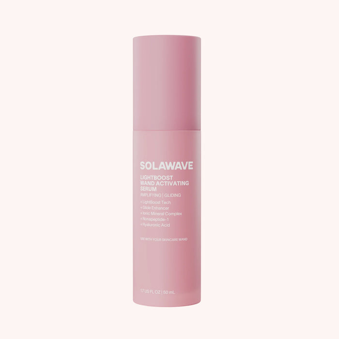 Solawave Light Therapy Boosting Wand and Activating Serum for skincare, showing the serum and light therapy device in use.