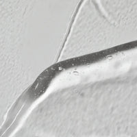 Solawave Light Therapy Boosting Wand and Activating Serum for skincare, shown with the wand and serum bottle on a white background.