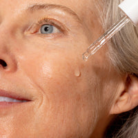 Solawave Pre- & Probiotic Plumping Peptide Serum in a glass bottle with a dropper for skincare topicals.