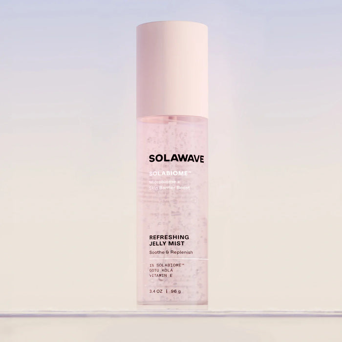 Solawave Pre- & Probiotic Refreshing Jelly Mist for skincare, featuring a clear bottle with a spray nozzle and refreshing mist inside.