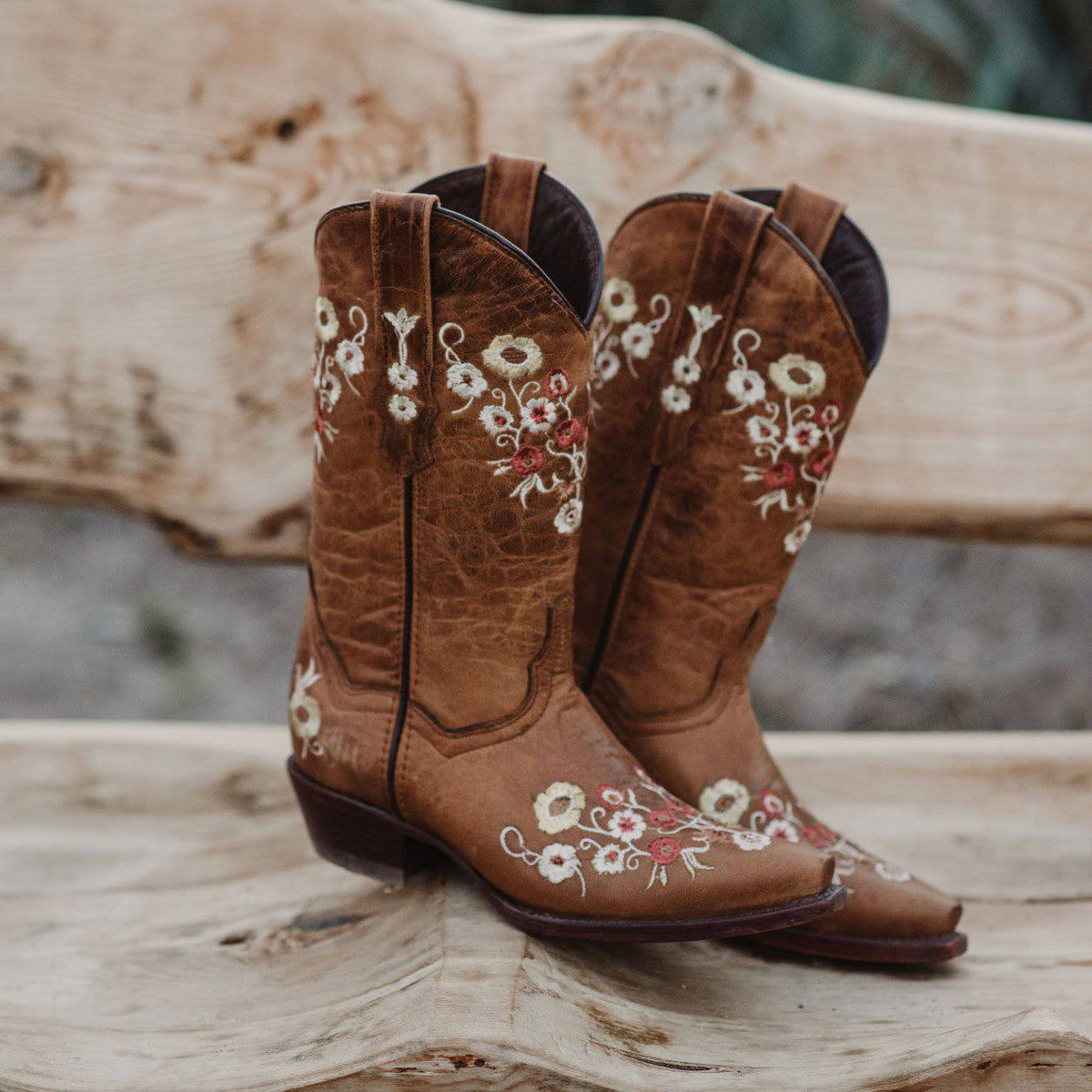 Women's snipped toe Western cowboy boots by Soto Boots featuring floral embroidery and tan leather design.