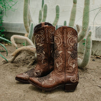 Tan Soto Boots women's cowgirl boots with rose inlay design, featuring pointed toes and Western stitching.