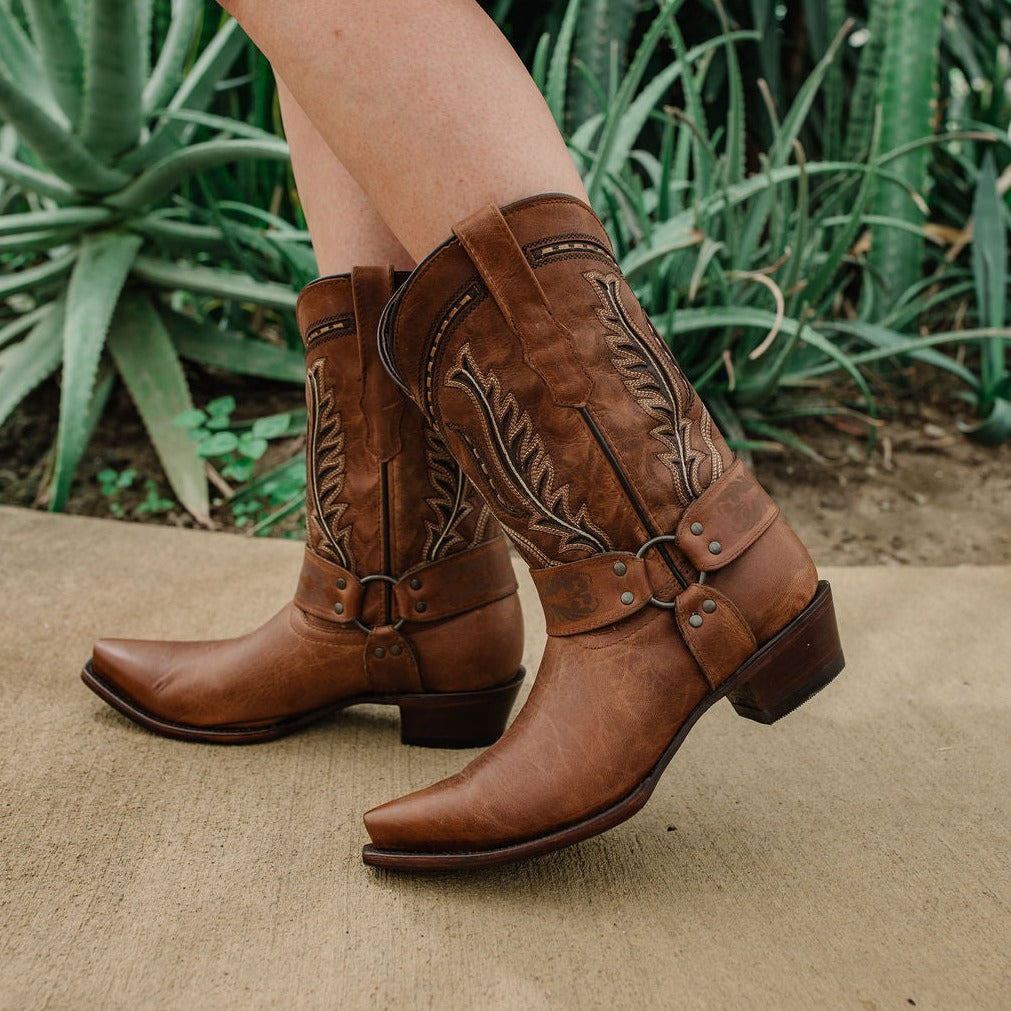 Brown leather women's harness cowgirl boots by Soto Boots, featuring stylish harness strap details and classic Western design.