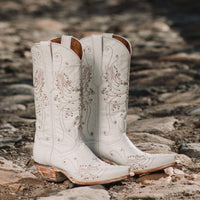 White rhinestone cowgirl boots by Soto Boots featuring intricate detailing, perfect for wedding or western style occasions.