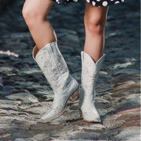 White rhinestone cowgirl boots by Soto Boots featuring classic Western style, perfect for wedding or casual wear.