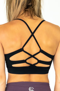 Soul Fire Apparel Co Hatha Sports Bra in black, featuring supportive design and breathable fabric for active wear.