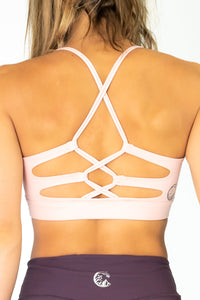 Soul Fire Apparel Co Hatha Sports Bra in black with supportive straps, designed for active wear and comfort during workouts.