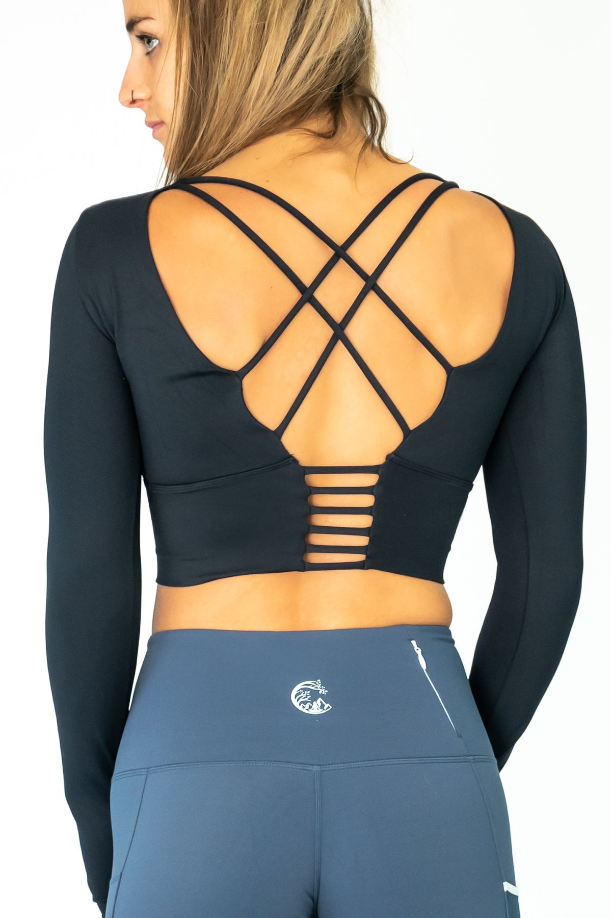 Soul Fire Apparel Co Classic Aya crop-long sleeve top, shown in natural fabric with a relaxed fit, displayed on a hanger against a white background.