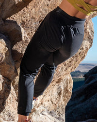 Gray Onsight Joggers by Soul Fire Apparel Co, featuring a relaxed fit and elastic waistband, displayed on a hanger.