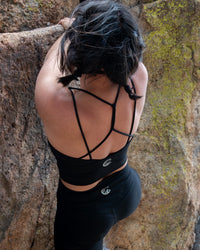 Soul Fire Apparel Co halo crop top featuring a stylish, fitted design with a high neckline and sleeveless cut.
