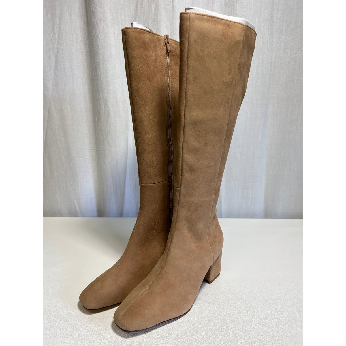Southern Satin Ann Taylor 2.5-inch block heel suede tall boots for women, in Dominican Sand color, shown from the front.