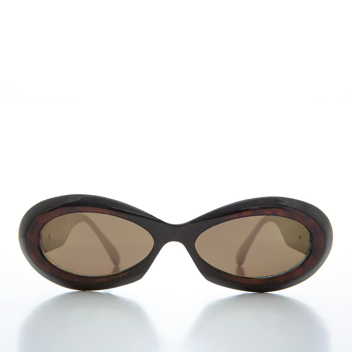 Classic chunky oval women's sunglasses by Sunglass Museum with thick black frames and dark lenses.