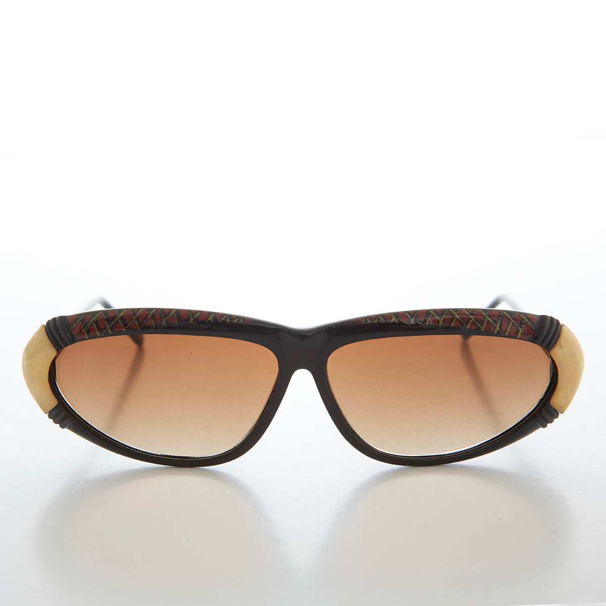 Womens 80s vintage sunglasses by Sunglass Museum, Rachel style, featuring retro round frames and tinted lenses.
